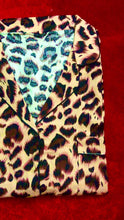 Load and play video in Gallery viewer, Cream Cheetah Fleece
